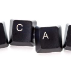 computer keys spelling the word scam concept